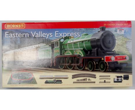 A Hornby R1122 Eastern Valleys Express train set containing LNER green class B12 engine and tender, 2 teak clerestory coaches