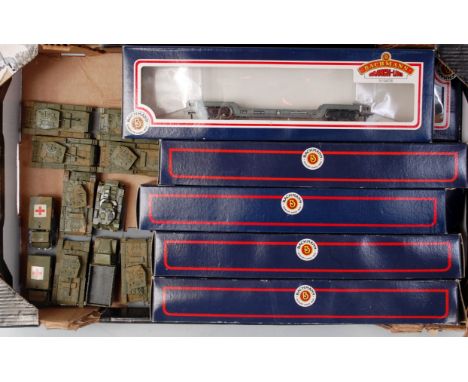 6 Bachmann 33-901A BR grey bogie well wagons (G-B,FG) together with 6 military vehicle loads for the above (G)