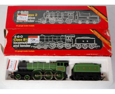 A Hornby R150 class B12 engine and tender NE black (G-BP), a similar in box, inner only LNER green 8509 (G-BD), and a R857 Iv