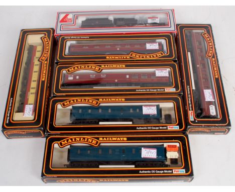 A Lima BR black 'Crab' 2-6-0 engine and tender (NM-BG) and 6 Mainline corridor coaches, 3 maroon 3 BG vans 1 red/cream, 2 blu