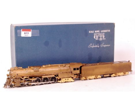 A United Scale Models Japanese built brass unpainted Sante-Fe 4-8-4 engine and tender supplied by Pacific Fast Mail (G-BG) 