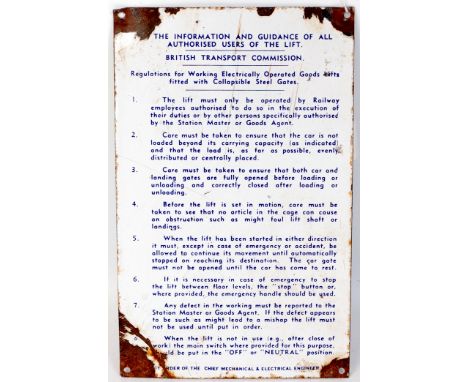 A black on white enamel sign British Transport Commission 'Information and Guidance for using lifts', some minor loss bottom 