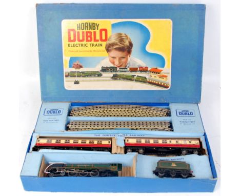 A Hornby Dublo EDP12 train set containing gloss green 'Duchess of Montrose' engine and tender, 2 D12 coaches, track oval and 