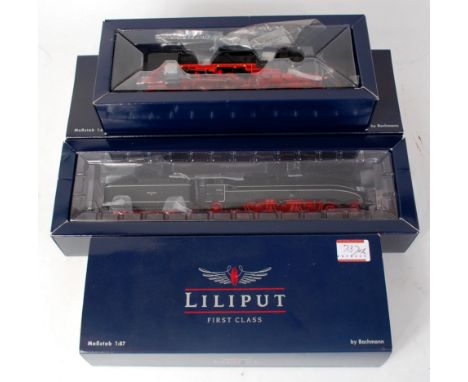 A Liliput H0 L11103 black streamlined class BR01 1062 DR eagle 4-6-2 engine and  tender (G-BG), together with a L106203 class