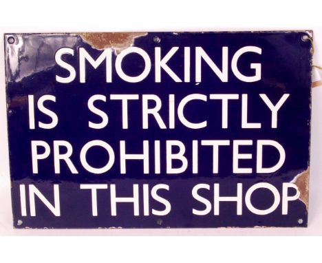 BR (E) enamel sign "SMOKING IS STRICTLY PROHIBITED IN THIS SHOP." Measures 18" X 12" and ex Stratford 30A.
