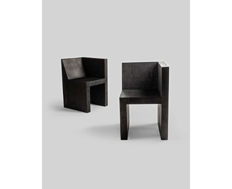 Rick Owens (American 1962-) Pair of 'Half Box' Chairs, designed circa 2011 black plywoodDimensions:each 76cm high, 50cm wide,