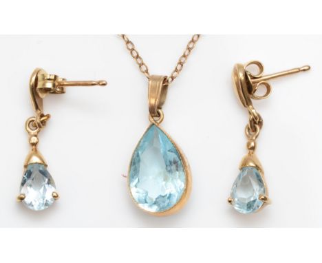 A 9ct gold pear cut topaz pendant, on 9ct chain, 19mm, together with a matching pair of drop earrings, 3.7gm. 