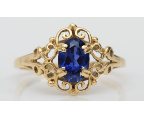 A 14ct gold single stone synthetic sapphire dress ring, K, 1.5gm 