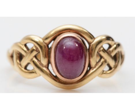 Clogau, a 9ct  Welsh gold single stone ruby dress ring, with Celtic knot shoulders, N-O, 2.8gm. 