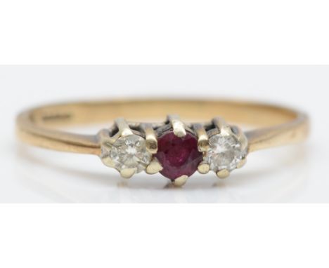 A 9ct gold three stone synthetic ruby and brilliant cut diamond ring, L-M, 1.3gm. 