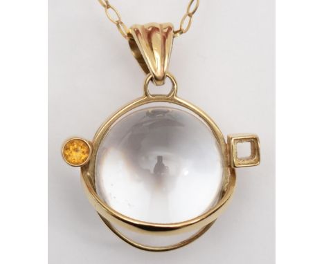 A 9ct gold rock Crystal and citrine pendant on 9ct gold chain, 22mm, 8.8gm. 