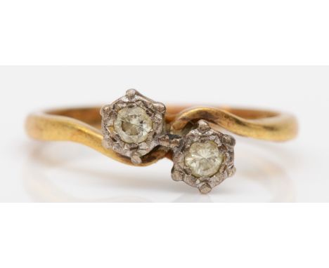 An 18ct gold brilliant cut illusion set diamond dress ring, M, 2.6gm. 