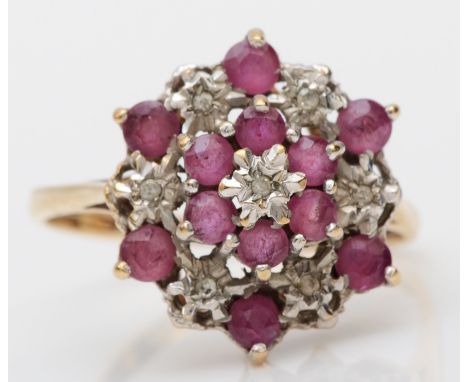 A 9ct gold ruby and eight cut diamond cluster ring, S, 3.3gm. 