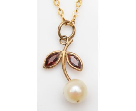 A 9ct gold garnet and cultured pearl floral pendant, on 9ct gold chain, 15mm, 1.3gm. 