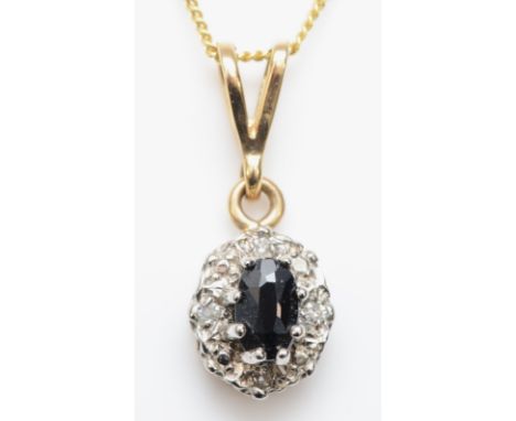 A 9ct gold sapphire and illusion set diamond pendant, on 375 gold chain, 1.6gm. 