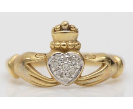 A 9ct gold eight cut diamond cluster Claddagh ring, O, 1.9gm. 