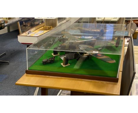 A large cased static kit built model of a Lancaster bomber, case size 65 x 78 x 22cm. Together with operation Chastise story 