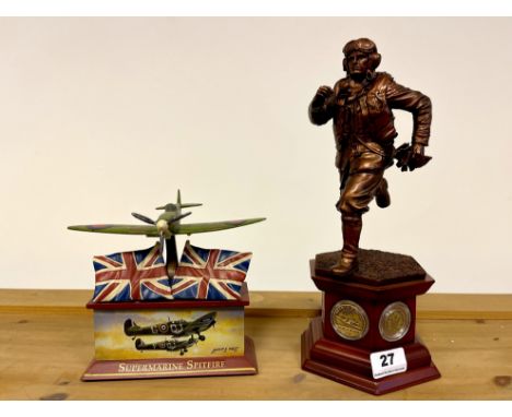 A resin model of a pilot and a Super Marine Spitfire. Pilot height is 31cm.