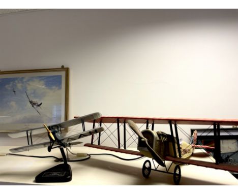 A commercial metal, wood and mixed materials biplane model "The Flying Circus" wingspan 81cm L. 50cm. Together with a further