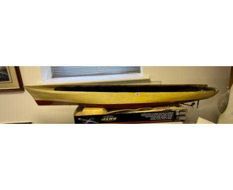 A fiberglass model hull for a potentially working model yacht. L. 174cm.