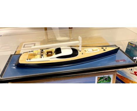A perspex cased static wooden scale model of a Mersea Oyster. Case L. 119cm H. 35cm W. 28cm. (Original commission cost £3,000