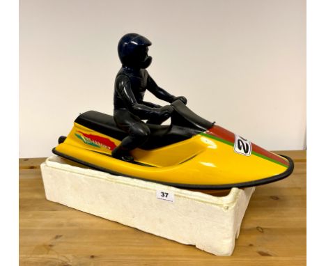 A perspex model of a jet ski. Radio controls obsolete. L 65cm.