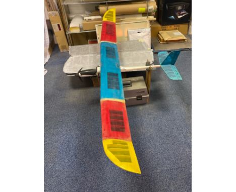 A handmade working model of a motorized glider together with a toolbox, Wingspan 210cm.