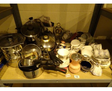 Shelf of kitchen pan sets several part tea ornaments clock etc 