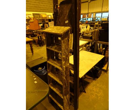 Two wooden step ladders