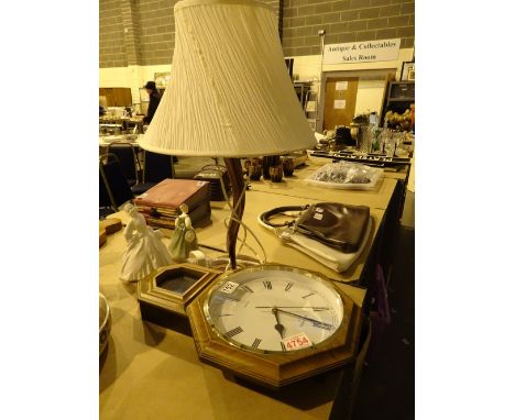 Widdop quartz movement wall clock and a table lamp