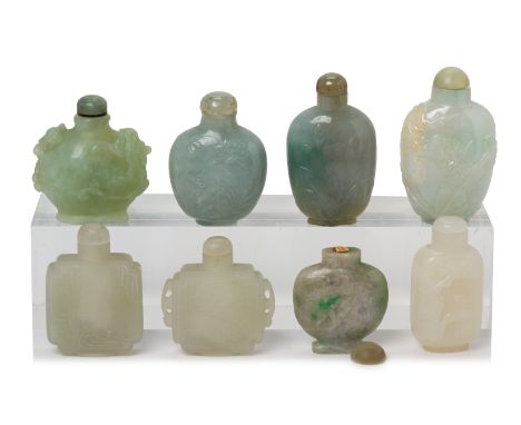 A GROUP OF EIGHT CARVED JADE SNUFF BOTTLES
Most with shallow carved foliate decoration
*
Condition: For a condition report or