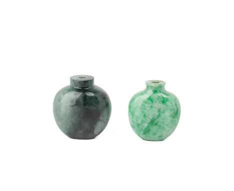 TWO JADE SNUFF BOTTLES Both of polished flattened spherical form * Condition: For a condition report or further images please