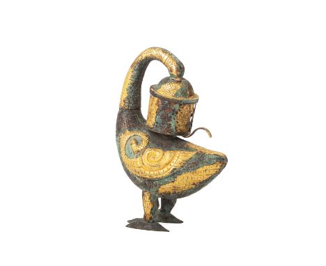 A CHINESE COPPER GILT MYTHICAL BIRD LAMP With slender curved neck and head positioned as though it grips the lamp, decorated 