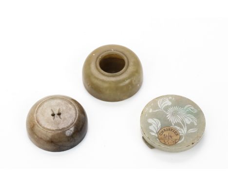 THREE JADE CARVINGS Comprising: a circular water pot or brush washer, of domed shape, Christie's label to underside dated 3.5