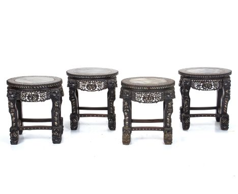 A SET OF FOUR MOTHER OF PEARL INLAID AND MARBLE INSET STOOLS .\With carved and pierced decoration and foliate mother of pearl