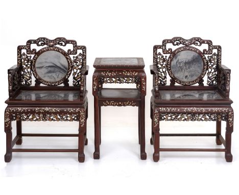 A PAIR OF MOTHER OF PEARL AND MARBLE INSET CHAIRS AND TABLE
The backrest and seat inset with marble panels, the frame carved 