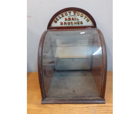 A vintage Select tooth &amp; nail brushes mahogany cabinet with domed glass front and internal glass shelf with mirrored back