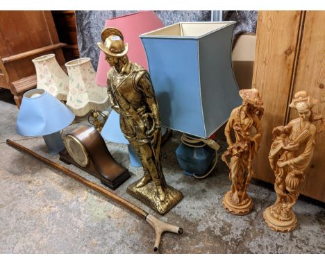 A mixed lot to include mixed table lamps, mid 20th century 8-day mantle clock, three large figures to include one of a knight