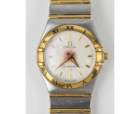 An Omega quartz ladies gold and stainless steel wristwatch having a white enamel dial with gilt baton markers, original crown