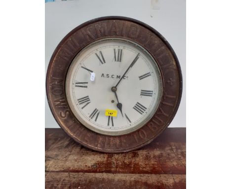 A vintage advertising clock 'Milkmaid Milk, Now's the time to buy it', in a metal frame A/F, 45cm diameter by the A.S.C M & C