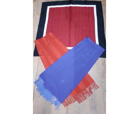 YSL-Three silk scarves, one in red, cream and black with dot pattern throughout and iconic YSL writing in the red centre, han