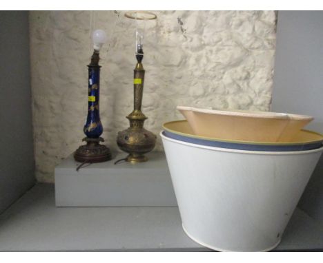 A Victorian gilt metal and blue glass baluster table with trailed enamel grape and vine decoration, and a later brass Islamic