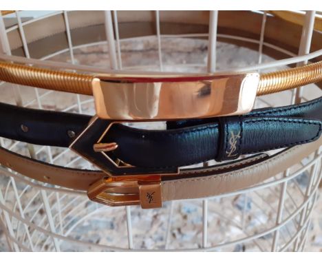 Two vintage YSL ladies leather belts with gold tone buckles, circa 1970's together with another Retro gold tone belt, elastic