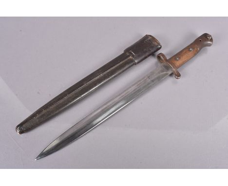 A British 1903 Pattern Mk1 bayonet by Wilkinson, with stamped 30cm double edge blade, with Middle Eastern writing stamped int