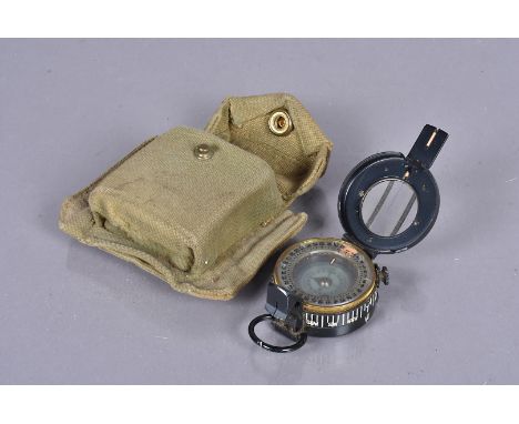 A WWII T.G. Co Ltd Mk III Field Compass, dated 1943, no.B262727, complete with canvas carry case, case looks to be stamped 19
