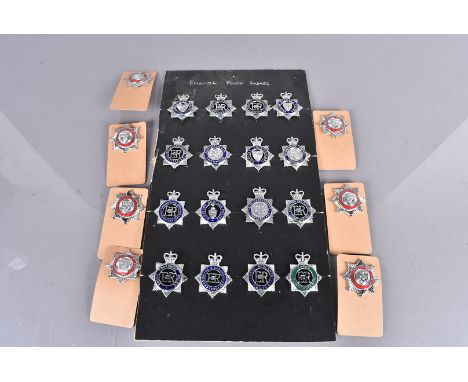 An assortment of Police and Fire Service enamel badges, including South Yorkshire, Devon &amp; Cornwall Dewsbury Borough, Not