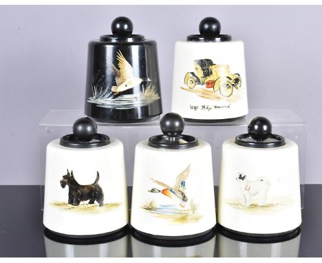 Five Dorset Light Industries Bakelite flintless table lighters, each with hand painted design, including 1905 Vauxhall, a Can