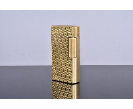 A Dunhill 70 gold plated lighter, serial CX467, also stamped C, and marked Patented, with engine turned geometric design, com