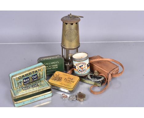 A Military Issue Clinometer, stamped R.S.A, with serial B6283 and broad arrow, complete with matching number carry case, toge