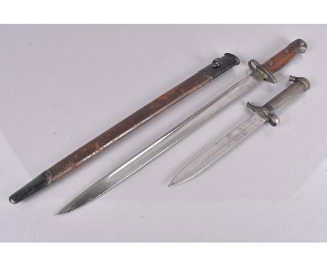 A British 1907 Pattern bayonet by Wilkinson, dated '16, complete with leather and steel scabbard, together with a Swedish M18